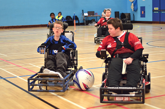 Two Sevenoaks Powerchair FC players mid game