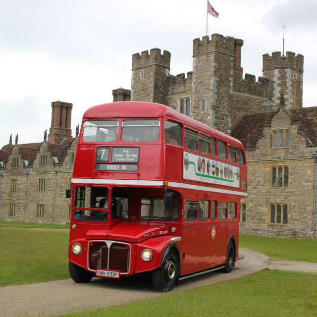 Image of the Vintage Bus positioned outside Knole House 